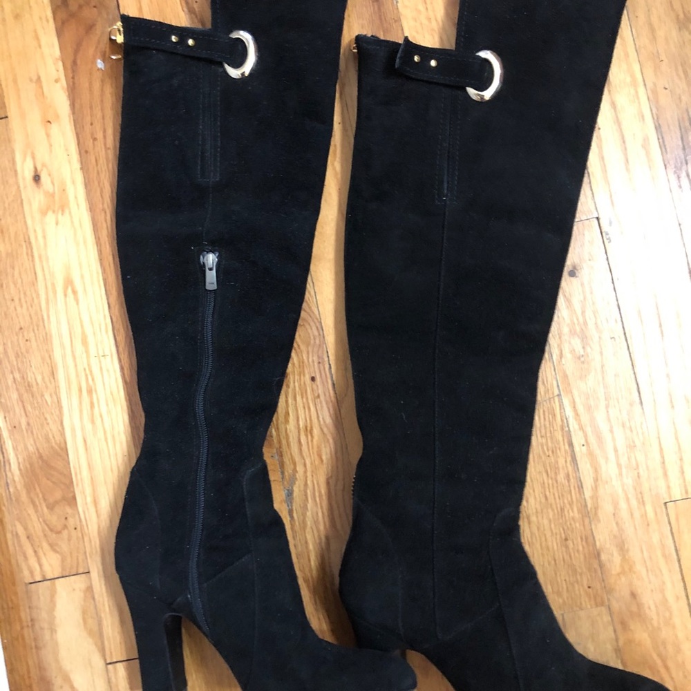 Black suede boots with gold hardware